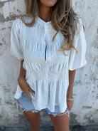 Kelly | Elegant Smocked Peplum Blouse - Picela